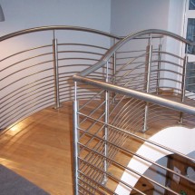 Stainless steel handrail to arched bridge