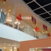 Retail mezzanine with curved open edge and feature balustrade