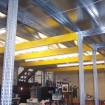 Different beams used for various spans on floor over racking