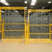 Up & over pallet gates in high visibility yellow finish complete with steel deck plate