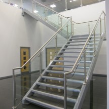 Bespoke feature staircase and stainless-glass handrail